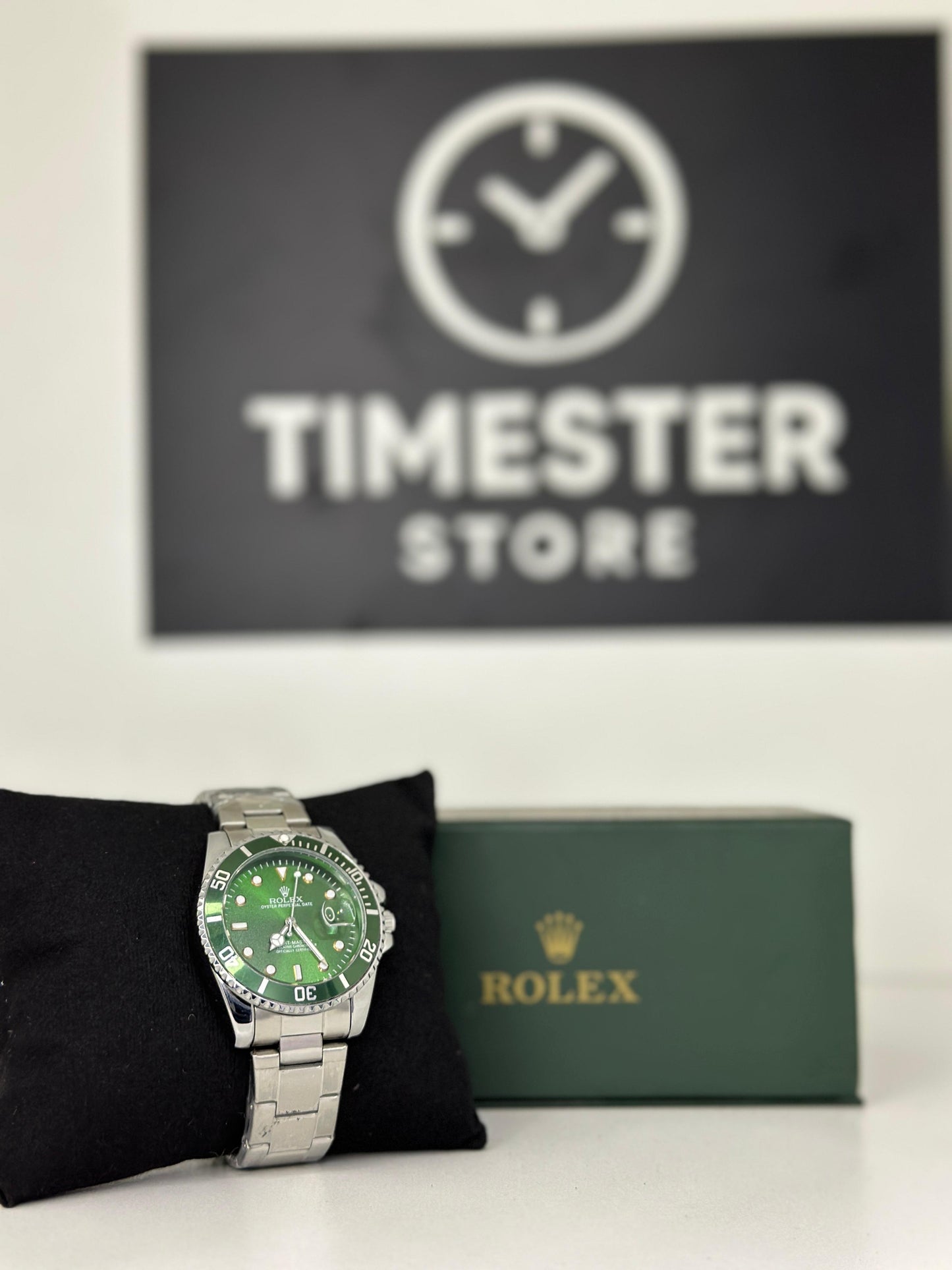 Rolex submariner silver with Racing Green rotating dial with date