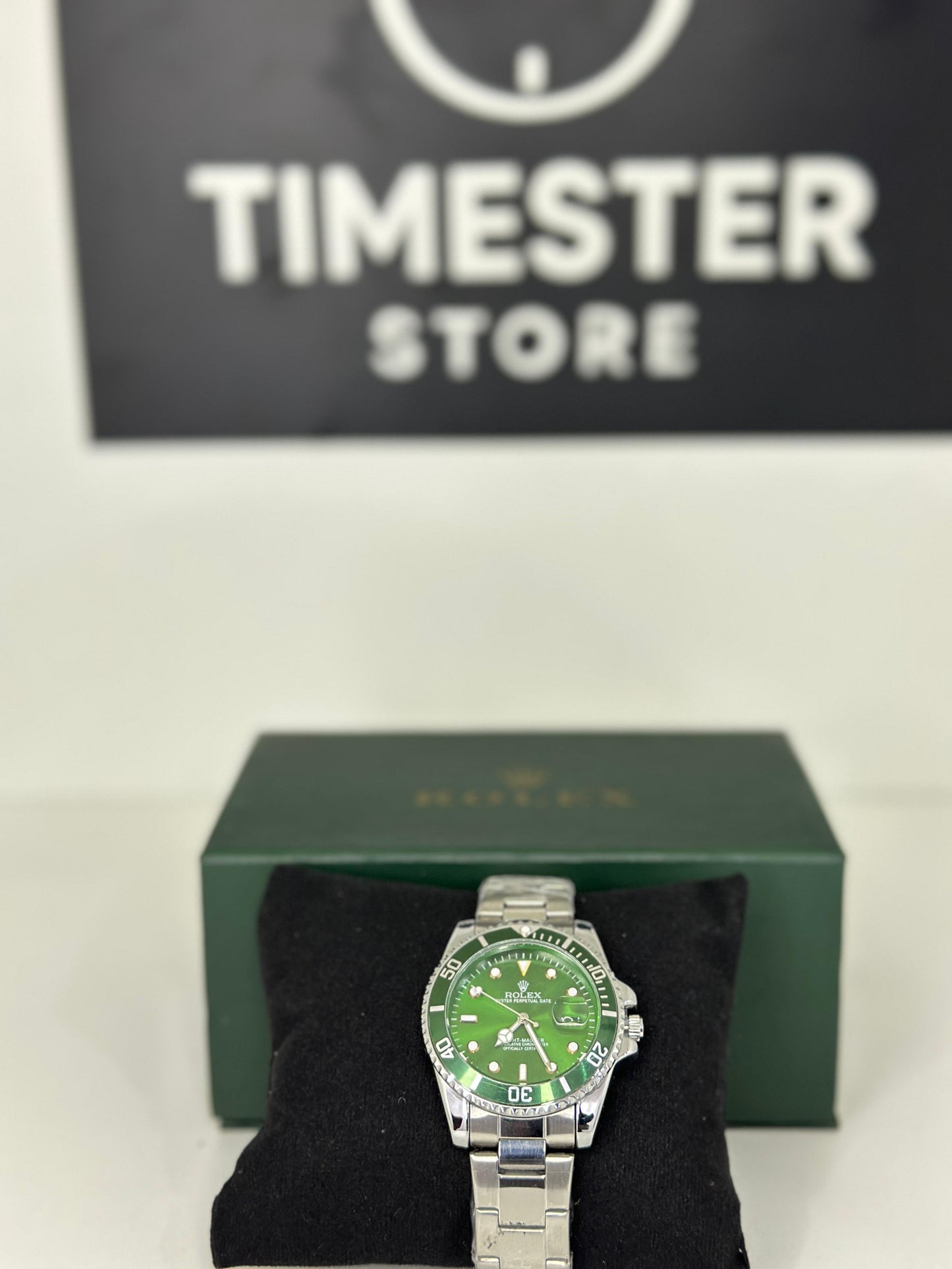 Rolex submariner silver with Racing Green rotating dial with date