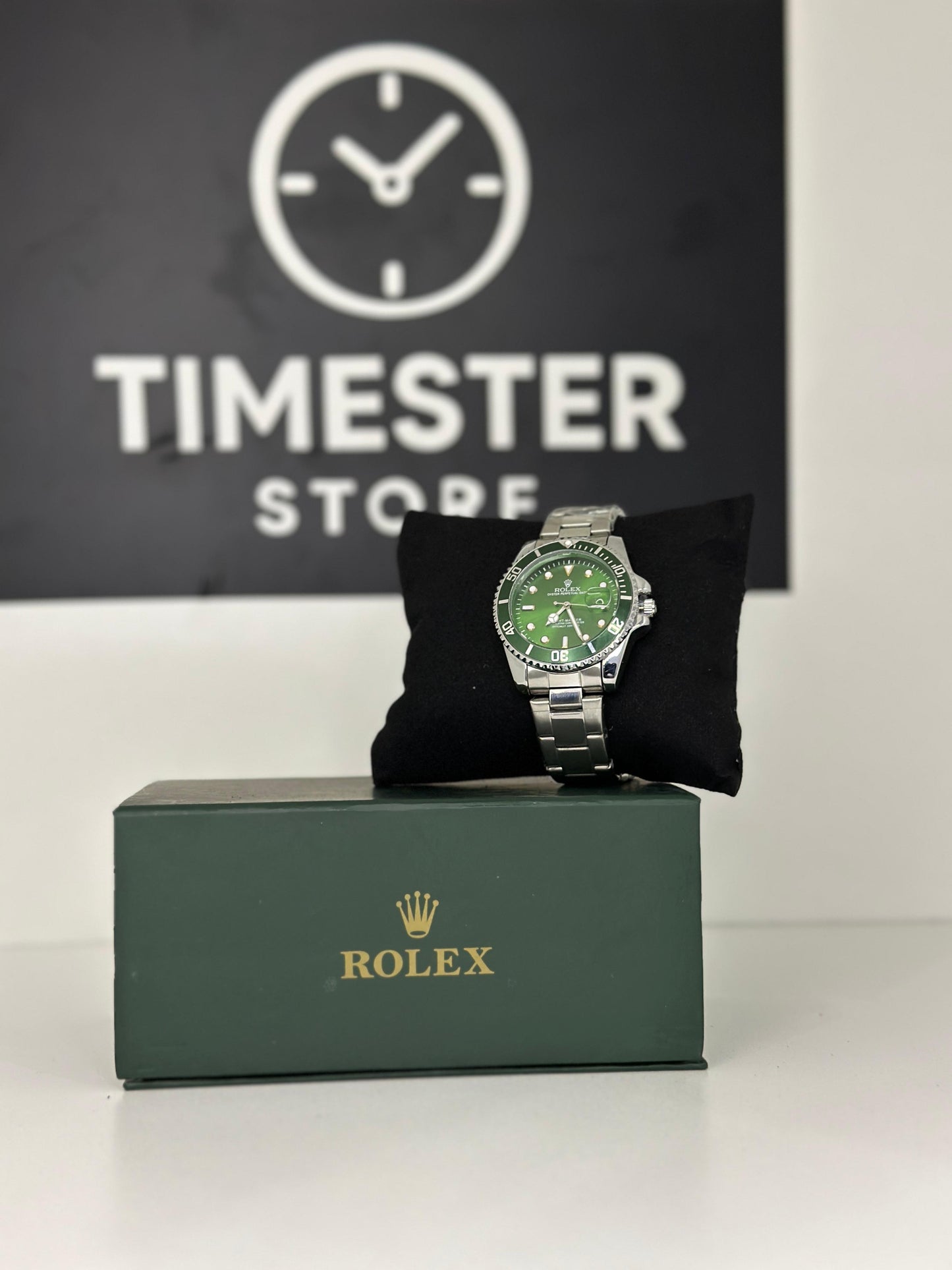 Rolex submariner silver with Racing Green rotating dial with date