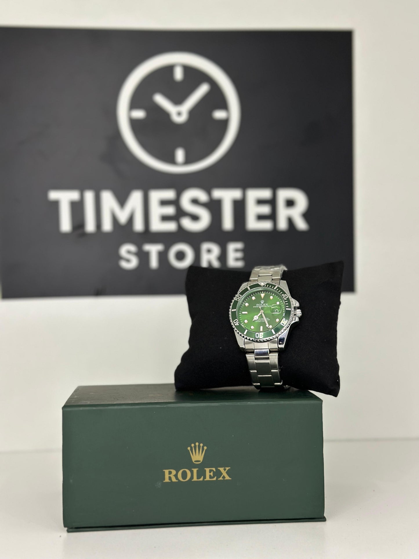 Rolex submariner silver with Racing Green rotating dial with date
