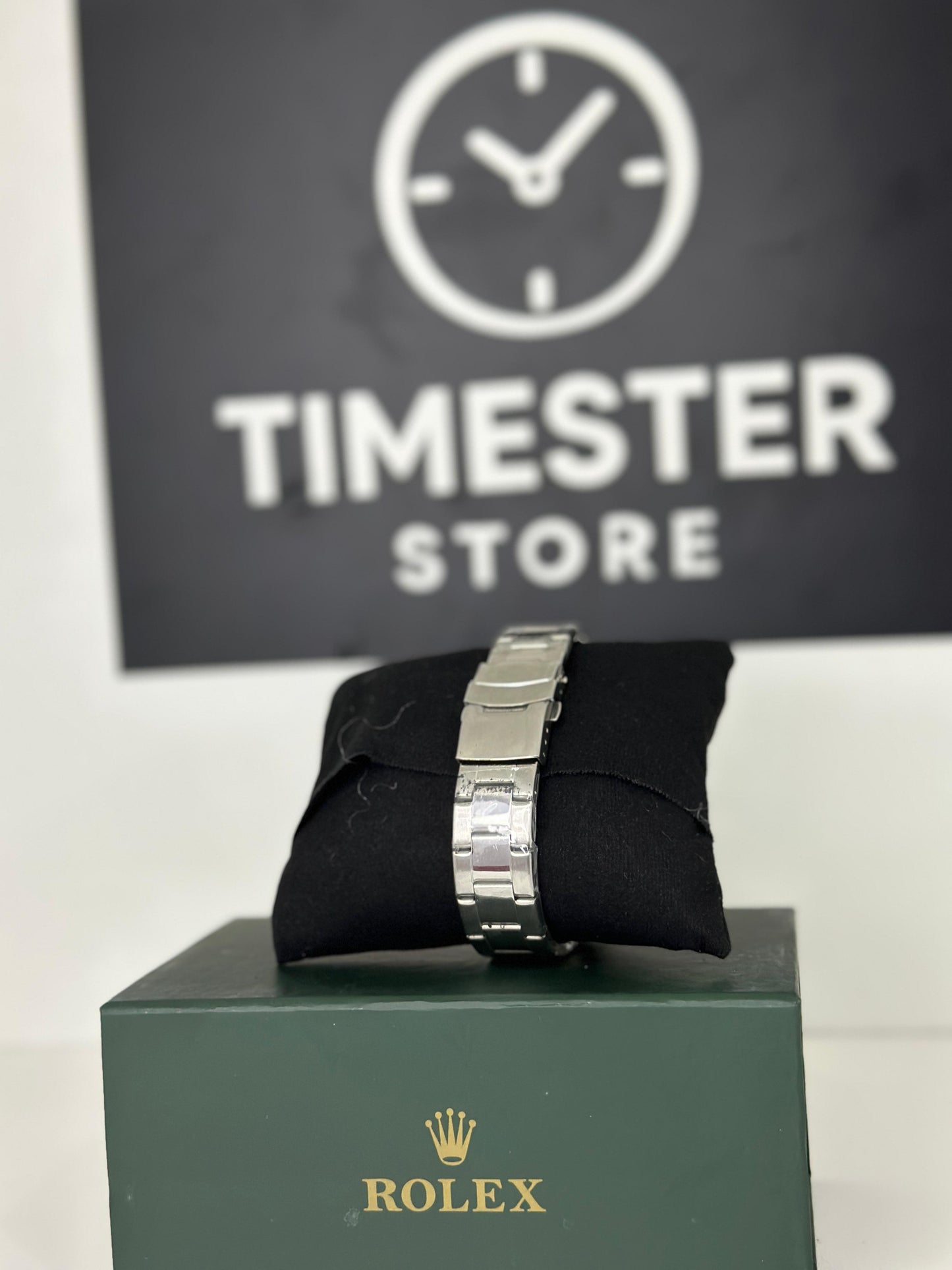 Rolex submariner silver with Racing Green rotating dial with date